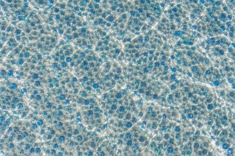 Glass bead pool finish in aqua and blue under clear water